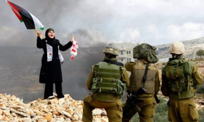 Palestinezja përballë ushtarëve izraelitë