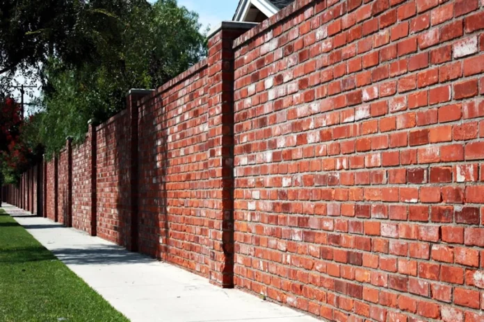 Homeguide red brick wall privacy fence