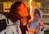 Vajza iraniane e pambuluar djeg foton e Khomeinit dhe ndez cigaren… Vajza iraniane ndez cigaren në foton e Khomeinit