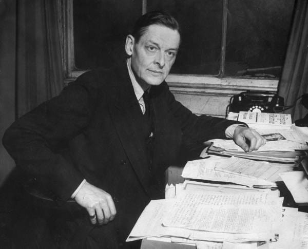TS Eliot at desk